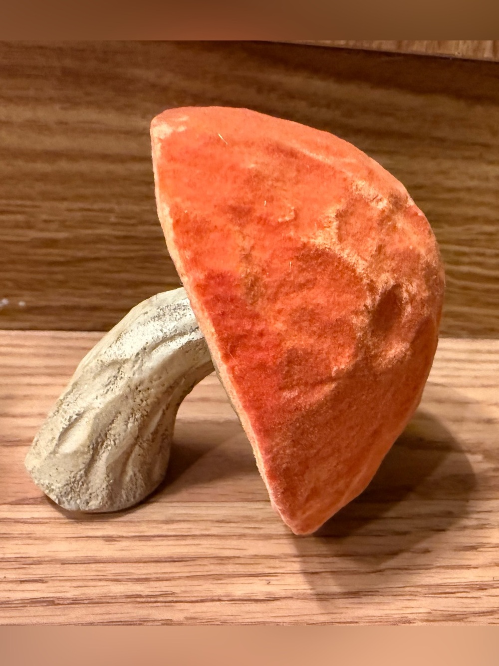 Rare Vintage Orange velvet leaning mushroom with a stone like base .